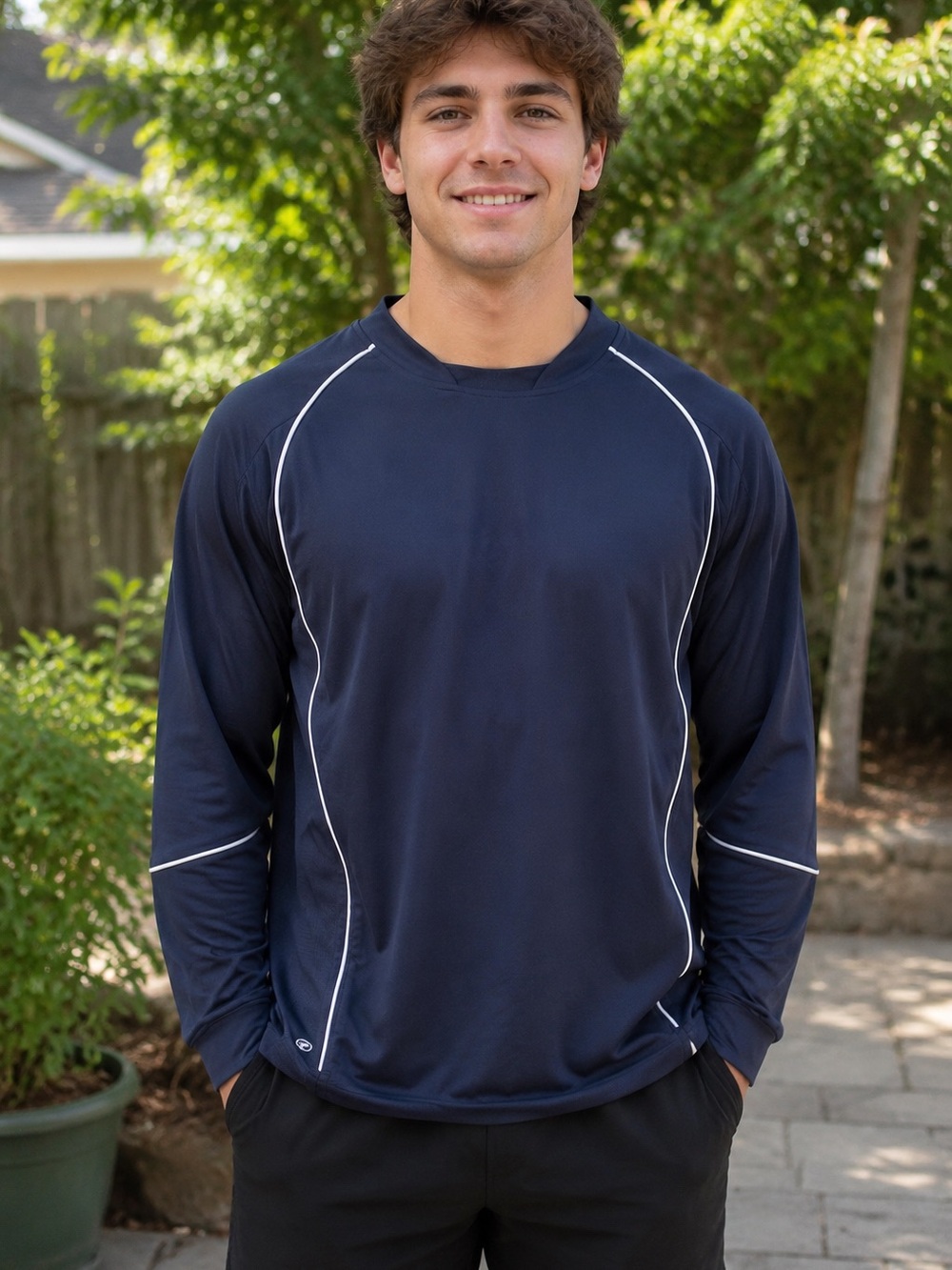 NWT Holloway navy blue long sleeve shirt with white piping along the shoulders.